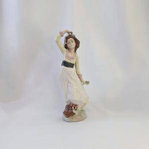 Vintage Nadal Porcelain Girl With Flowers Figurine | ONYX STORE CANADA