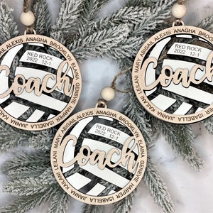 Custom coach volleyball ornament comes customized with the team name, year and up to 16 player names.  Double layered laser engraved ornament measures approx. 3.5" in diameter and comes with decorative bead and twine.