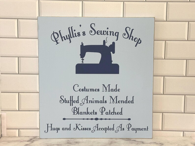 Celebrate Grandma’s love for sewing, quilting, and crafting with this handmade custom wood sewing room sign! Perfect for hanging in her sewing room, craft room, or quilting studio, this rustic wooden sign adds a warm, personal touch to her creative space. Whether you’re looking for a thoughtful gift for Grandma, a unique Mother’s Day present, or a way to make her sewing corner extra special, this personalized sign will be treasured for years to come. Customizable with any name you choose.