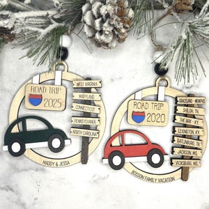 Add a touch of charm to your Christmas tree with our laser engraved wood road trip ornament. Handcrafted with love, this unique piece captures the essence of adventure. Perfect for travel enthusiasts and wanderlust souls! A wonderful gift for anyone who loves hitting the open road. We can add up to 7 locations on this ornament to customize this to your favorite adventure. Order yours today!