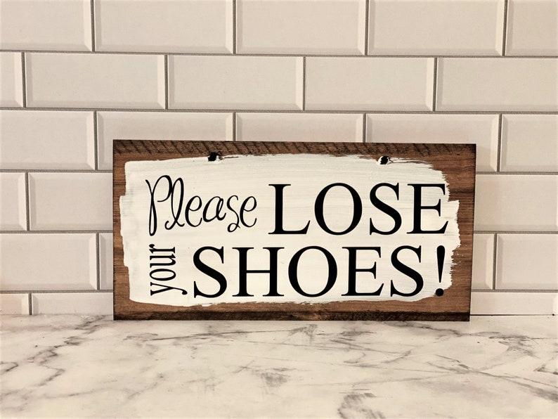 Please lose your shoes comes with holes and is easy to hang on any basket.  Basket and ribbons not included.  Comes in a variety of colors.