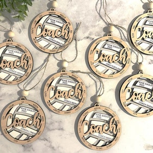 Custom coach volleyball ornament comes customized with the team name, year and up to 16 player names.  Double layered laser engraved ornament measures approx. 3.5" in diameter and comes with decorative bead and twine.