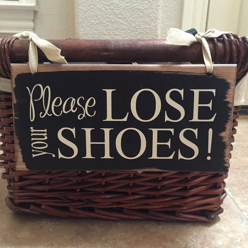 Please lose your shoes comes with holes and is easy to hang on any basket.  Basket and ribbons not included.  Comes in a variety of colors.