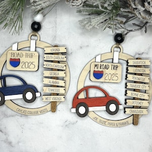 Add a touch of charm to your Christmas tree with our laser engraved wood road trip ornament. Handcrafted with love, this unique piece captures the essence of adventure. Perfect for travel enthusiasts and wanderlust souls! A wonderful gift for anyone who loves hitting the open road. We can add up to 7 locations on this ornament to customize this to your favorite adventure. Order yours today!