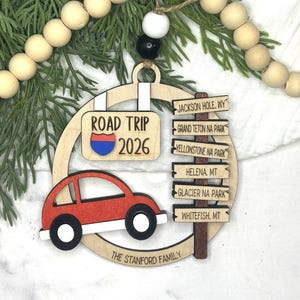 Add a touch of charm to your Christmas tree with our laser engraved wood road trip ornament. Handcrafted with love, this unique piece captures the essence of adventure. Perfect for travel enthusiasts and wanderlust souls! A wonderful gift for anyone who loves hitting the open road. We can add up to 7 locations on this ornament to customize this to your favorite adventure. Order yours today!