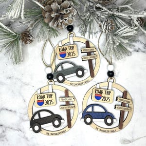Add a touch of charm to your Christmas tree with our laser engraved wood road trip ornament. Handcrafted with love, this unique piece captures the essence of adventure. Perfect for travel enthusiasts and wanderlust souls! A wonderful gift for anyone who loves hitting the open road. We can add up to 7 locations on this ornament to customize this to your favorite adventure. Order yours today!