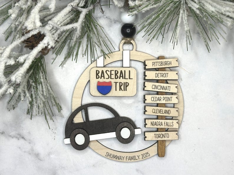 Add a touch of charm to your Christmas tree with our laser engraved wood road trip ornament. Handcrafted with love, this unique piece captures the essence of adventure. Perfect for travel enthusiasts and wanderlust souls! A wonderful gift for anyone who loves hitting the open road. We can add up to 7 locations on this ornament to customize this to your favorite adventure. Order yours today!