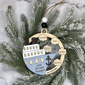 This beautifully crafted customized cruise ship ornament is the perfect way to commemorate your nautical adventures. Handmade with care, this charming ornament can be personalized with your family name, ship name, ports and cruise dates.