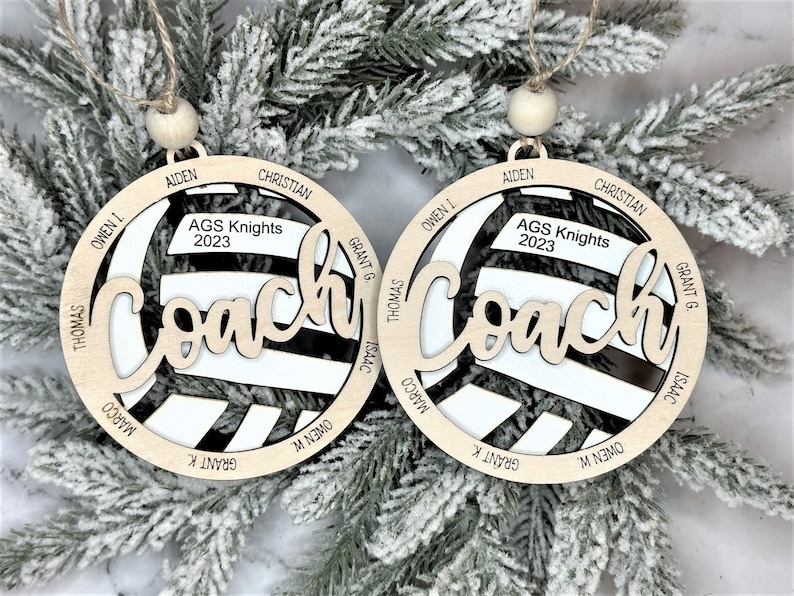 Custom coach volleyball ornament comes customized with the team name, year and up to 16 player names.  Double layered laser engraved ornament measures approx. 3.5" in diameter and comes with decorative bead and twine.