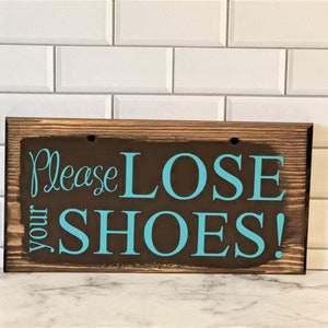 Please lose your shoes comes with holes and is easy to hang on any basket.  Basket and ribbons not included.  Comes in a variety of colors.