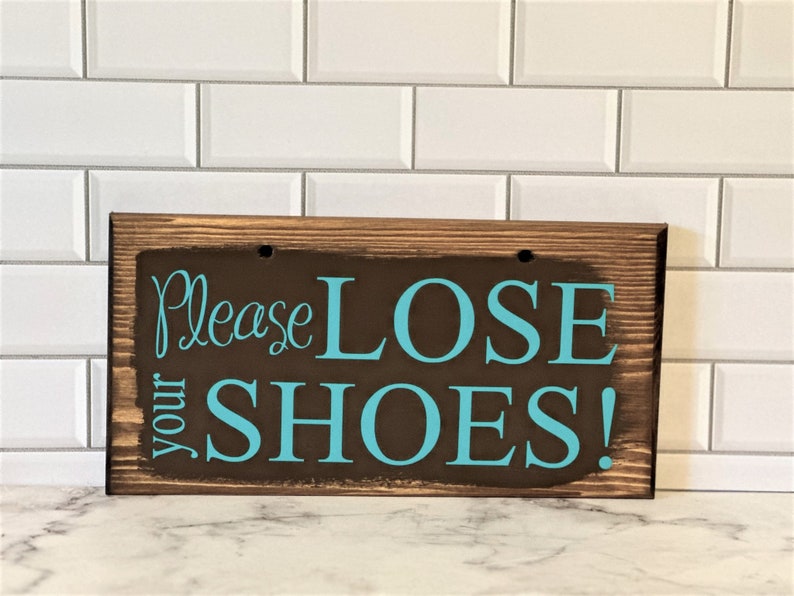 Please lose your shoes comes with holes and is easy to hang on any basket.  Basket and ribbons not included.  Comes in a variety of colors.