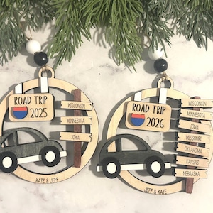 Add a touch of charm to your Christmas tree with our laser engraved wood road trip ornament. Handcrafted with love, this unique piece captures the essence of adventure. Perfect for travel enthusiasts and wanderlust souls! A wonderful gift for anyone who loves hitting the open road. We can add up to 7 locations on this ornament to customize this to your favorite adventure. Order yours today!