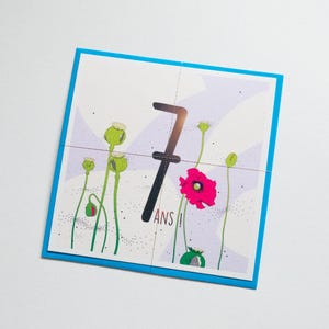 Carte d'anniversaire 7 ans joyeuse et colorée pour enfant - thèmes nature et fleurs des champs. Vendu avec une enveloppe assortie.