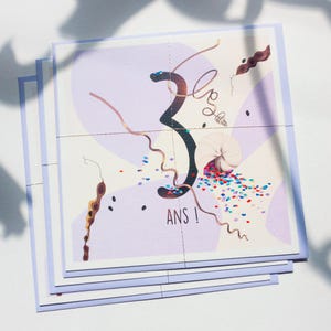 Carte d'anniversaire 3 ans joyeuse et colorée pour enfant - thème escargot, confettis, nature. Vendu avec une enveloppe assortie.
