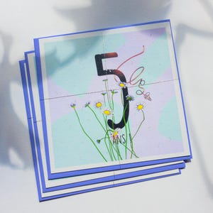 Carte d'anniversaire 5 ans joyeuse et colorée pour enfant - thèmes sur les pâquerettes et la nature. Vendu avec une enveloppe assortie.