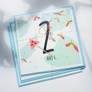 Carte d'anniversaire 2 ans joyeuse et colorée pour bébé et enfant - thèmes nature / jeux en plein air. Vendu avec une enveloppe assortie.