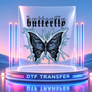 May include: A DTF transfer featuring a black butterfly graphic with human eyes on its wings, surrounded by light blue lightning bolts. The word butterfly is printed in a black gothic font above the butterfly. The design is displayed on a clear sheet.