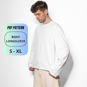 May include: A plain white long-sleeve shirt with a boxy fit. To the left, a blue and green gradient graphic box contains the black text: PDF PATTERN, BOXY LONGSLEEVE, S - XL, enclosed within a dashed line border.