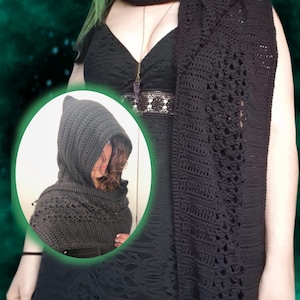May include: A black crochet hooded scarf and matching shawl. The hooded scarf is shown in a circular inset. The shawl is draped over the shoulders. The crochet work features open, decorative patterns.