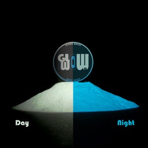 May include: A white powder that glows blue under a black light. The powder is labeled "Cloud White Glow Stone Glow in the Dark".