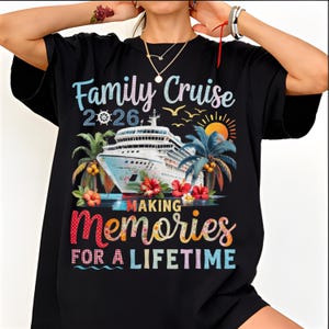 May include: Black t-shirt with a colorful graphic design. The design features a cruise ship, palm trees, flowers, and the text "Family Cruise 2026, Making Memories for a Lifetime."