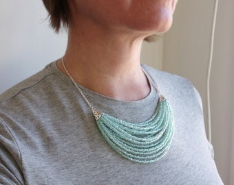 コーラルビーズネックレス XHk18PGoBnes.jpg?width=768