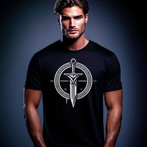May include: A black t-shirt with a white graphic of a sword inside a circle with a geometric pattern.