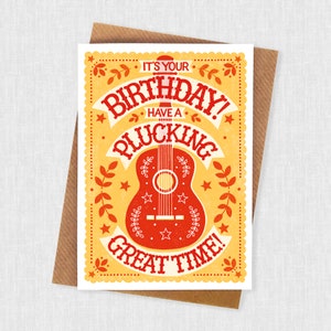 Carte d'anniversaire de joueur de guitare et d'ukulélé