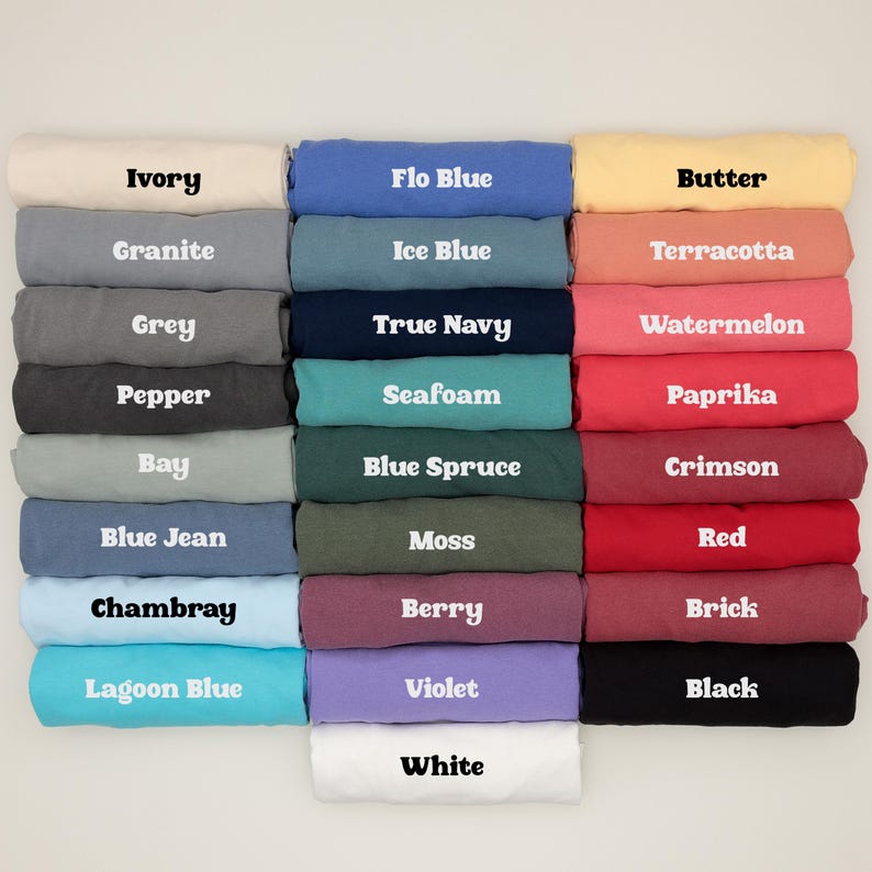 A collection of 24 different colored t-shirts arranged in a grid, with each color labeled.