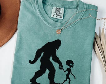 Bigfoot and Alien Abduction T-Shirt, Comfort Colors® UFO Footprint Shirt, UFO Lover Gift, Tee for Sasquatch Lovers, Space Fans, Paranormal