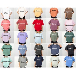The image is a collage of various t-shirt designs, each with a different color and style.