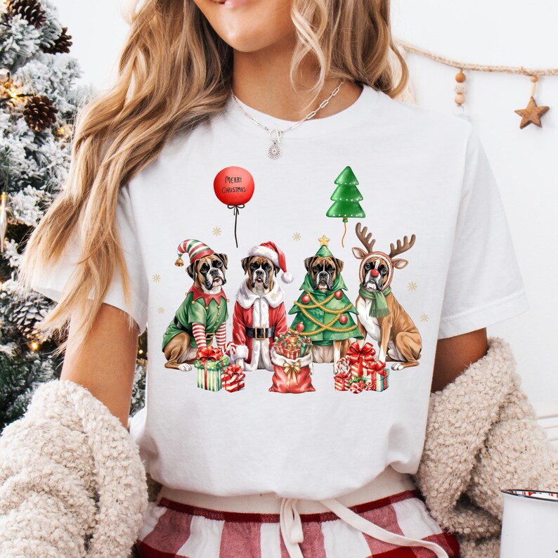Festive Christmas design featuring four boxer dogs in holiday costumes. The boxer dogs are dressed as Santa Claus, a reindeer, a Christmas tree, and an elf, surrounded by Christmas gifts and decorations. High-quality digital PNG with transparent background, perfect for sublimation projects, holiday crafts, T-shirts, mugs, and unique Christmas gifts for boxer lovers and pet owners. Bright, detailed artwork that captures the joy of the holiday season.