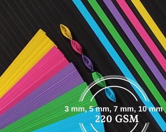 Puede incluir: Surtido de tiras de papel de colores para quilling, en azul, verde, morado, rosa y amarillo. Las tiras tienen 3 mm, 5 mm, 7 mm y 10 mm de ancho y 220 g/m².