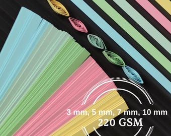 Puede incluir: Surtido de tiras de papel de color pastel en amarillo, rosa, verde y azul. Las tiras están dispuestas en forma de abanico y están etiquetadas con los anchos: 3 mm, 5 mm, 7 mm, 10 mm y 220 GSM.
