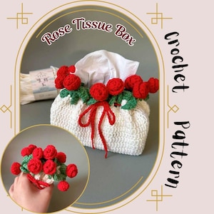 May include: A crocheted white tissue box adorned with red roses and green leaves. The tissue box has a red ribbon and the text "Rose Tissue Box" and "Crochet Pattern". A smaller image shows a hand holding a similar rose arrangement.