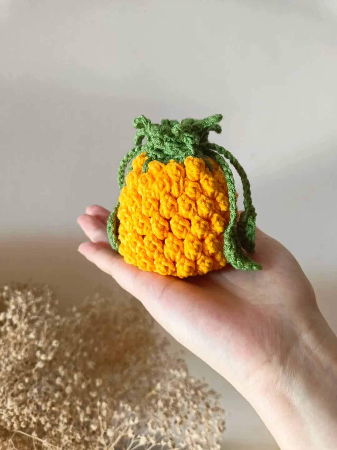 26 Crochet Makeup Bag Patterns with Clutches, Pouches, and Holders 22 Pineapple Mini Drawstring Bag Crochet Pattern Fruit