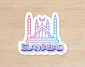May include: A sticker with a colorful outline of the Faisal Mosque in Islamabad, Pakistan. The sticker has a white background and the text "ISLAMABAD" in a 3D style.