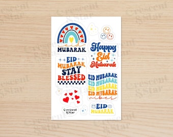 May include: A set of colorful stickers with various designs and text related to Eid Mubarak. The stickers feature a rainbow, hearts, smiley faces, and the text "Eid Mubarak", "Happy Eid Mubarak", "Stay Blessed", and "Eid Vibes".