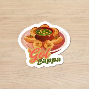 May include: A sticker with a cartoon illustration of gol gappa, a popular Indian street food. The sticker features a plate of gol gappa with a bowl of green chutney. The text "Gol Gappa" is written in a retro font.