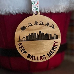 Keep Dallas Merry Ornament – Laser Engraved Light Maple Wood Dallas Skyline Christmas Décor