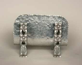 Aluminum napkin holder with magnolia base