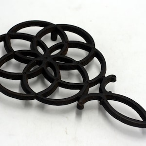 vintage Wilton Cast iron Trivet