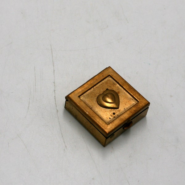 vintage  brass pillbox with embossed heart