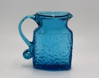 vintage blue art glass pitcher with applied handle