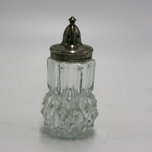 vintage glass shaker with silver plate top