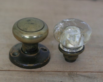 vintage pair of missmatched door knobs