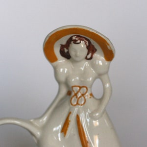 vintage ceramic lady with basket planter made in USA image 2