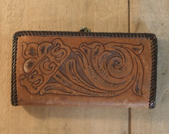 vintage tooled leather billfold or wallet