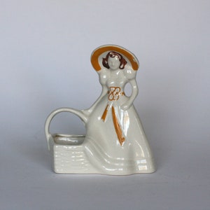 vintage ceramic lady with basket planter made in USA image 1