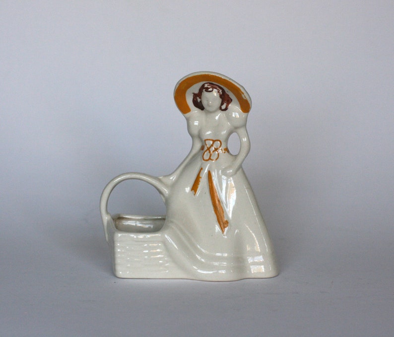 vintage ceramic lady with basket planter made in USA image 1